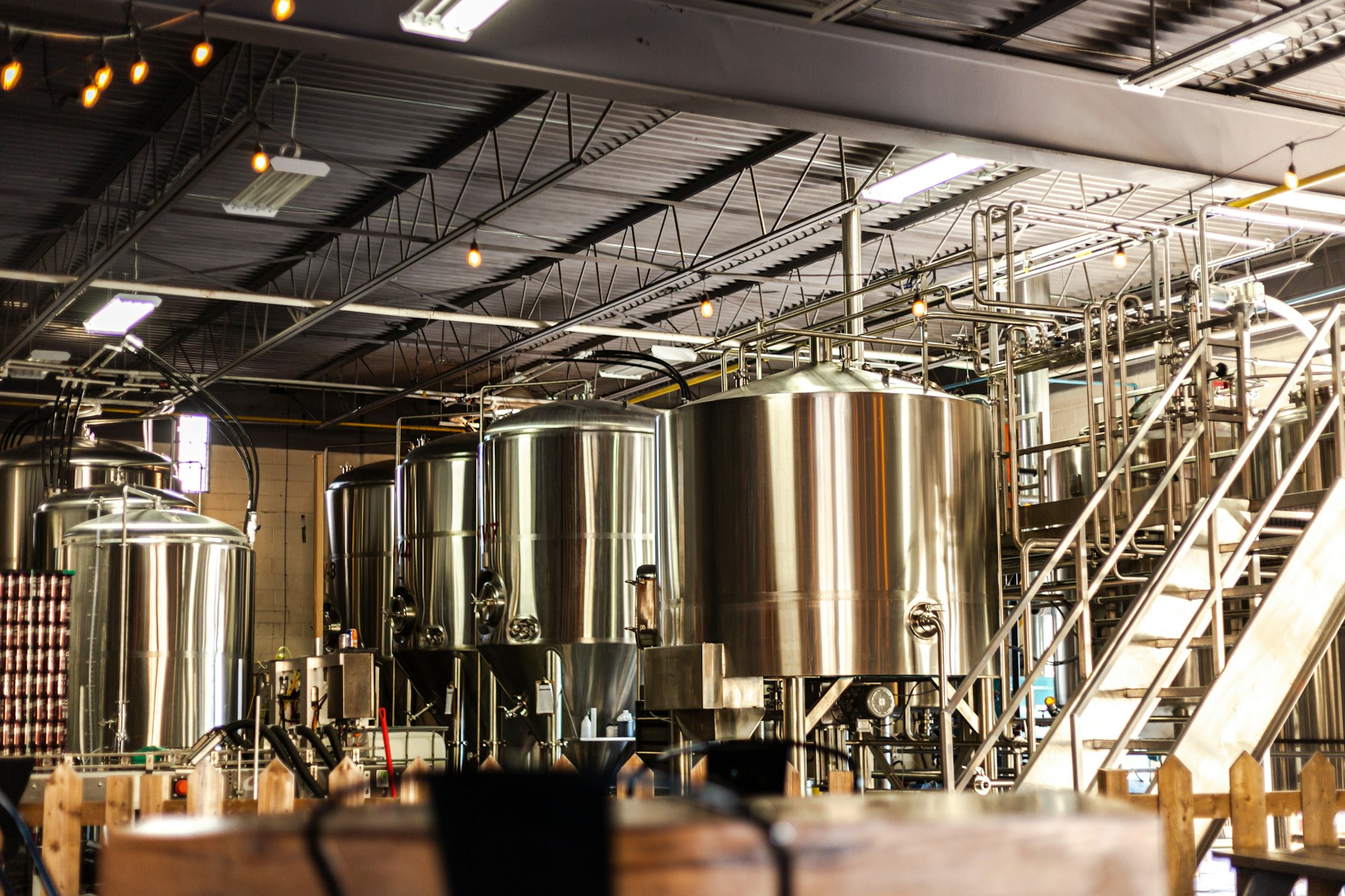 Beer brewery with shiny fermentation vessels